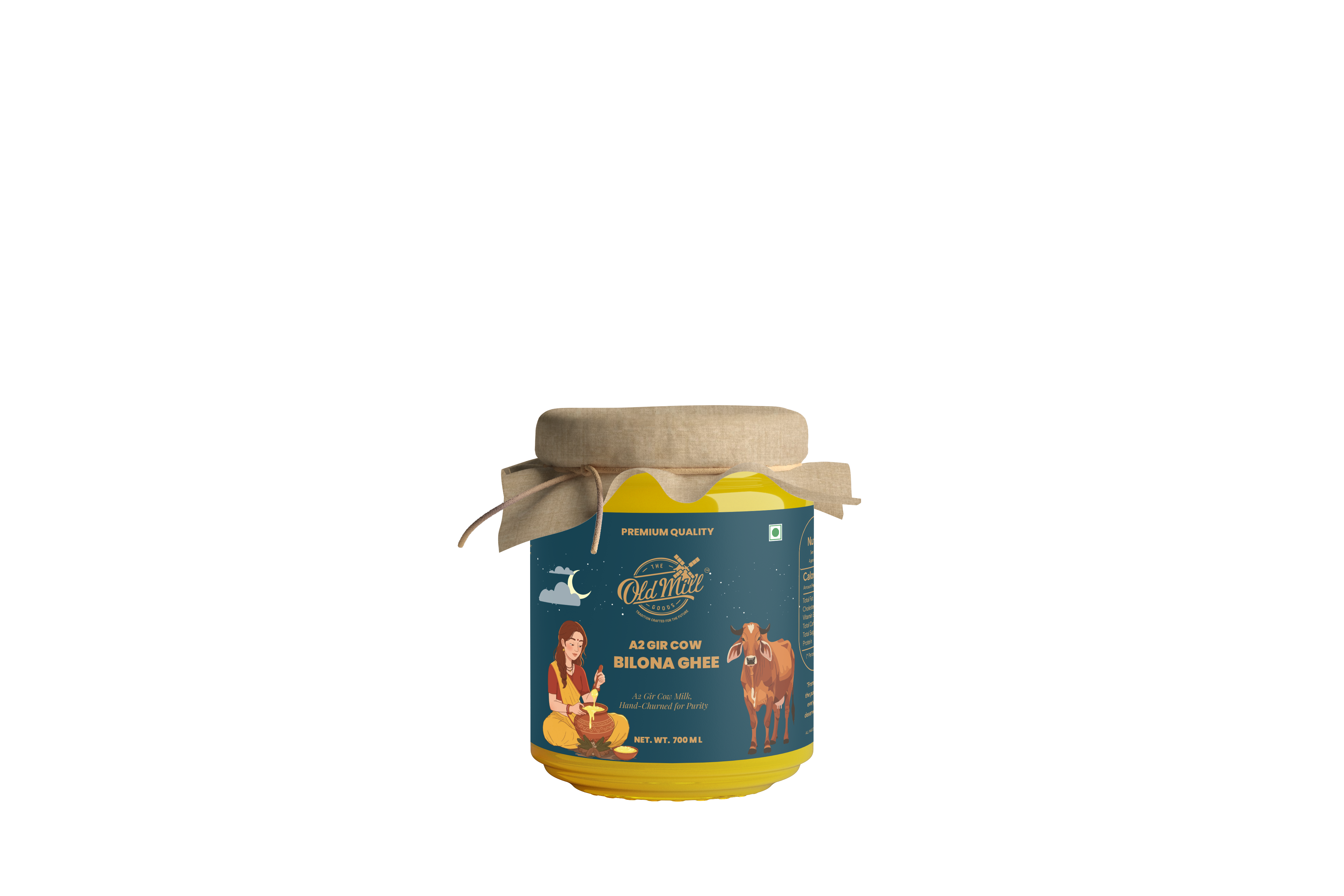 A jar of hand-churned A2 bilona ghee resting on the mill's granite floor